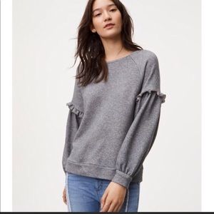 Gray loft sweater with ruffle detail